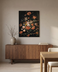 Flowers in a Glass Vase by Abraham Mignon in a black frame above a walnut sideboard in a dining room