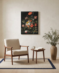 Flowers in a Metal Vase by Abraham Mignon as a stretched canvas above a linen lounge chair in a reading corner