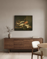 Still Life with Fish by Abraham van Beijeren in a black frame above a walnut sideboard in a dining room