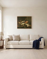 Still Life with Fish by Abraham van Beijeren framed in natural oak above a cream sofa in a warm living room