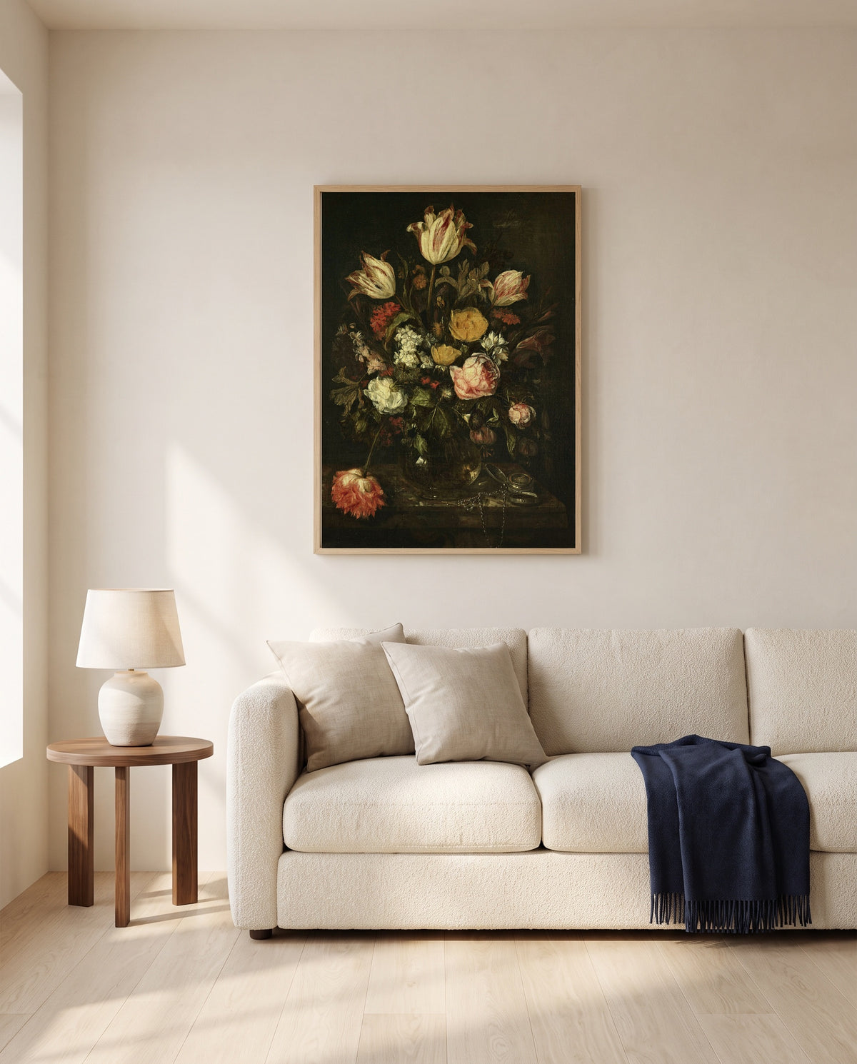 Flowers and a Watch by Abraham van Beijeren framed in natural oak above a cream sofa in a warm living room