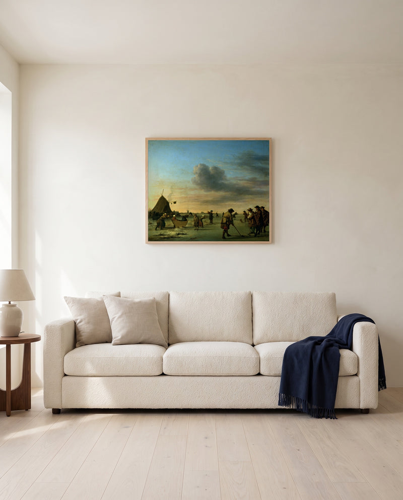 Golfers on the Ice by Adriaen van de Velde framed in natural oak above a cream sofa in a warm living room