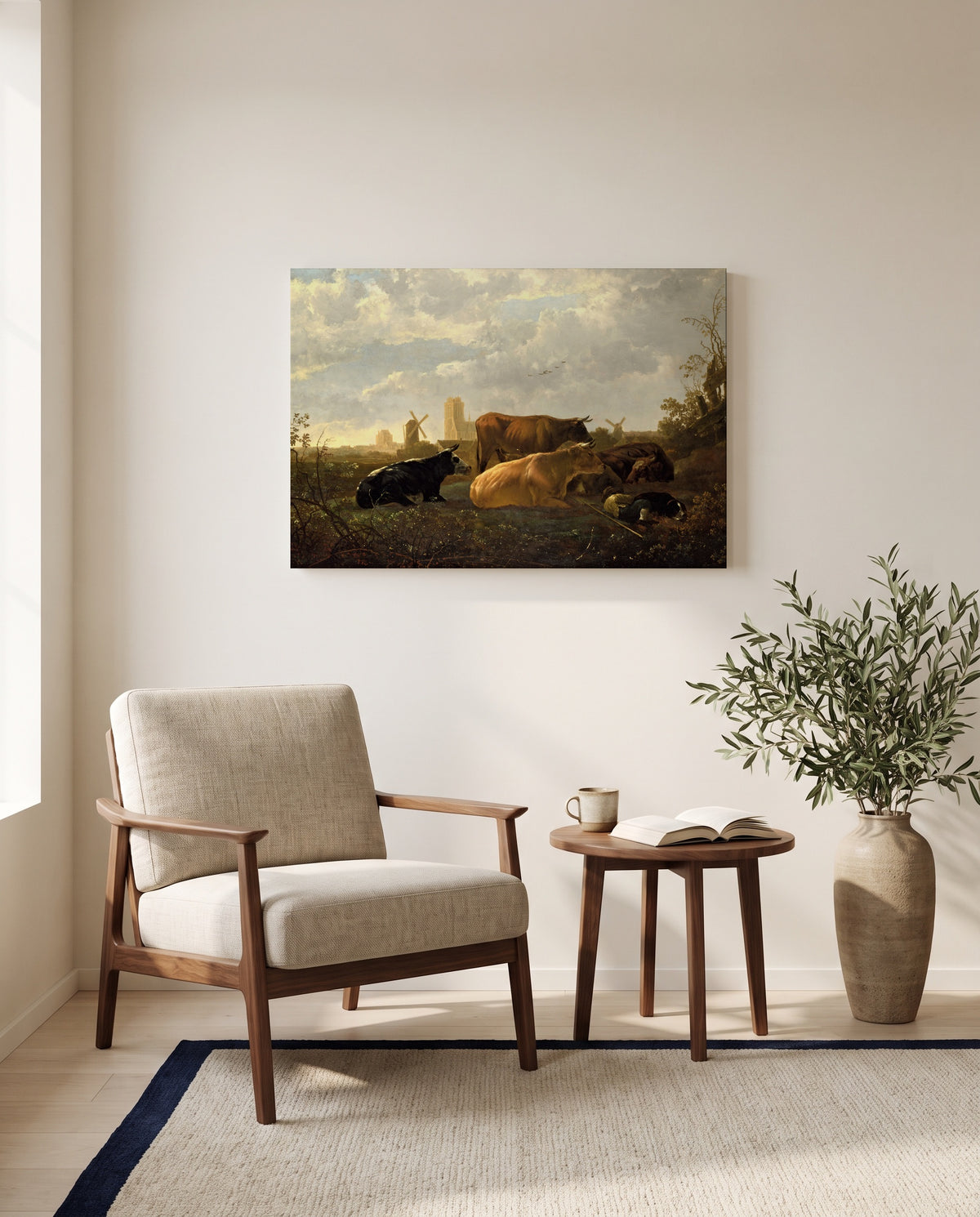 The Small Dort by Aelbert Cuyp as a stretched canvas above a linen lounge chair in a reading corner
