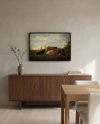 The Small Dort by Aelbert Cuyp in a black frame above a walnut sideboard in a dining room