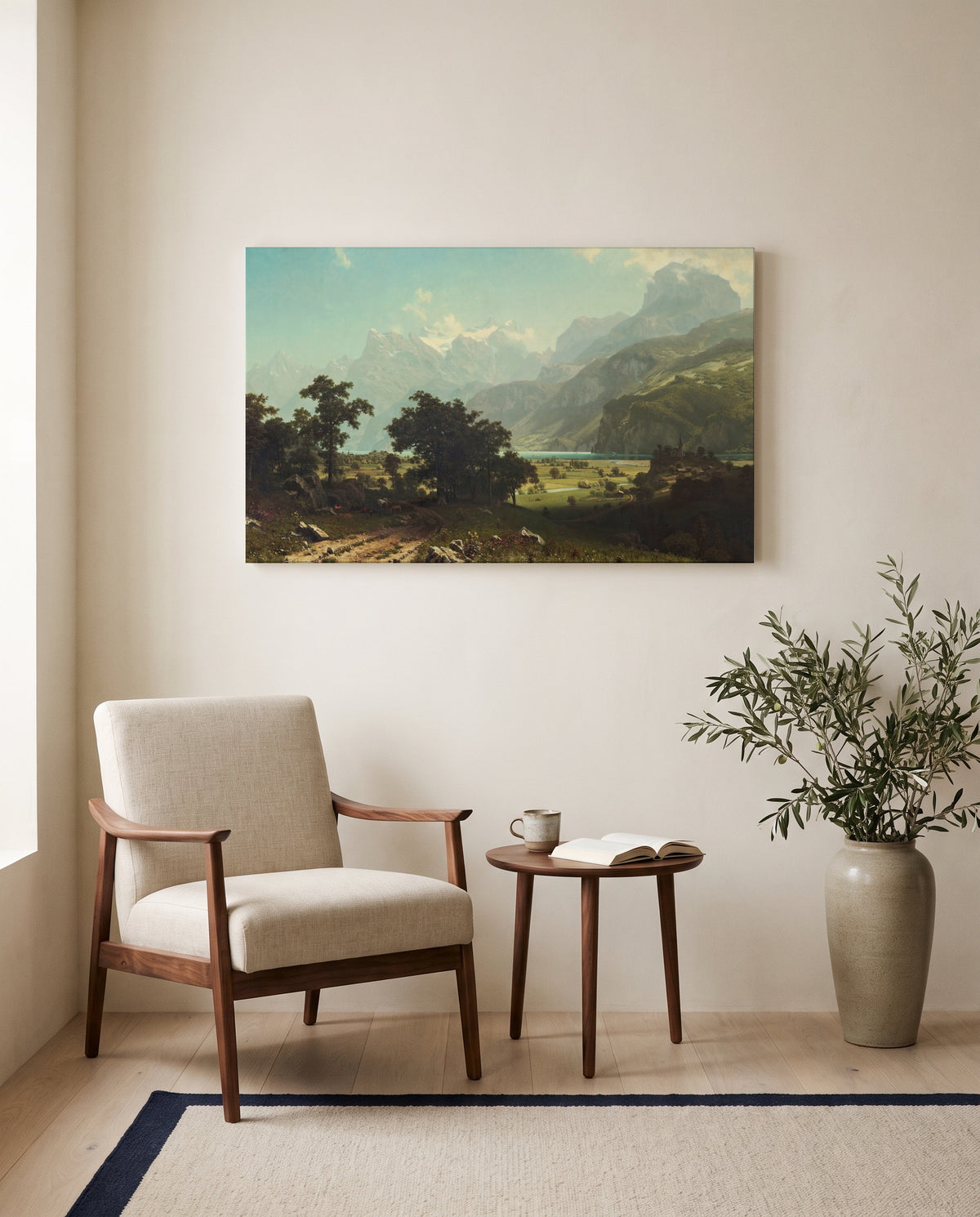 Lake Lucerne by Albert Bierstadt as a stretched canvas above a linen lounge chair in a reading corner