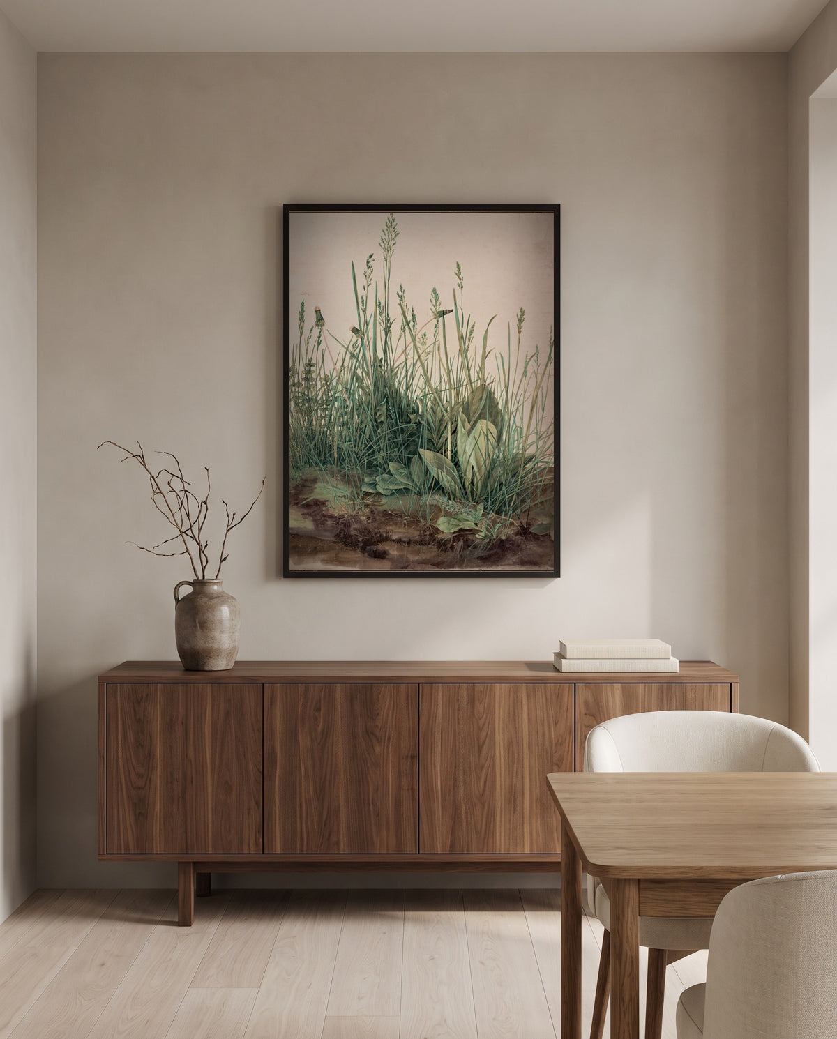 Great Piece of Turf by Albrecht Dürer in a black frame above a walnut sideboard in a dining room