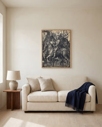 Knight, Death and the Devil by Albrecht Dürer framed in natural oak above a cream sofa in a warm living room