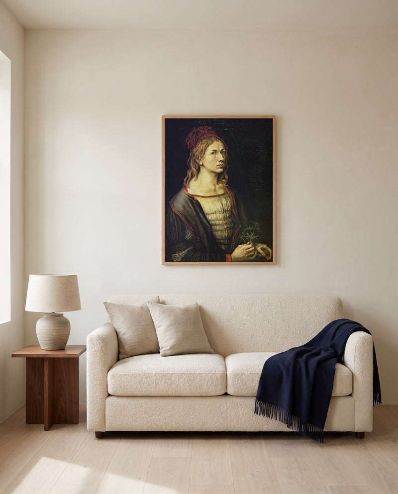 Self-Portrait with Thistle by Albrecht Dürer framed in natural oak above a cream sofa in a warm living room