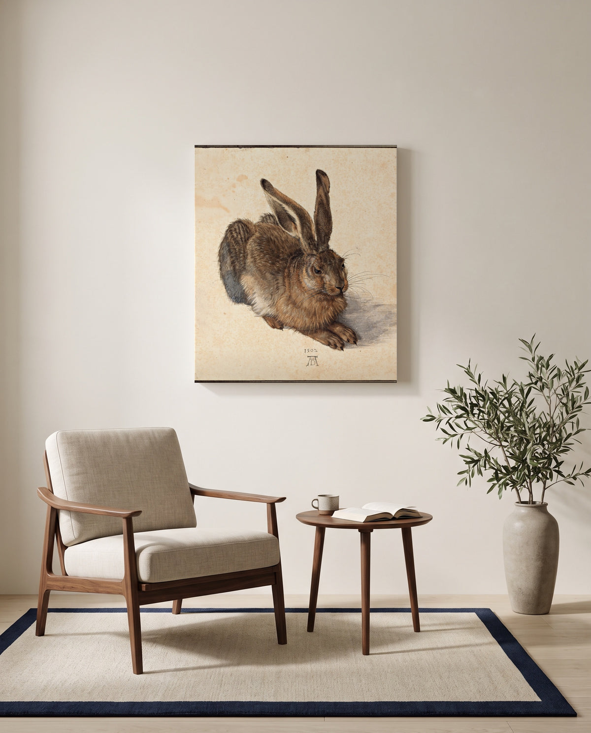 Young Hare by Albrecht Dürer as a stretched canvas above a linen lounge chair in a reading corner