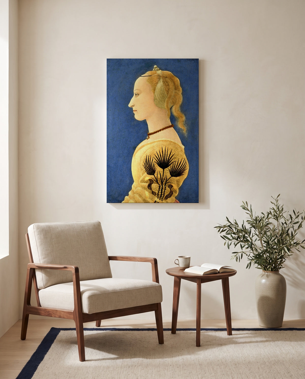 Portrait of a Lady in Yellow by Alesso Baldovinetti as a stretched canvas above a linen lounge chair in a reading corner