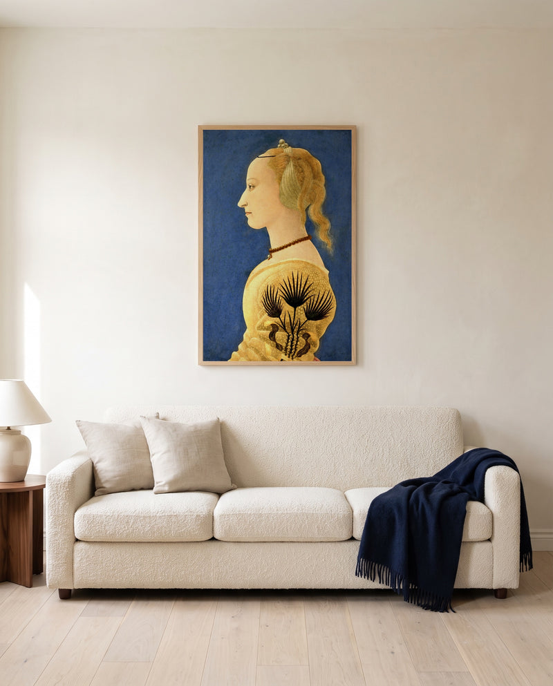 Portrait of a Lady in Yellow by Alesso Baldovinetti framed in natural oak above a cream sofa in a warm living room