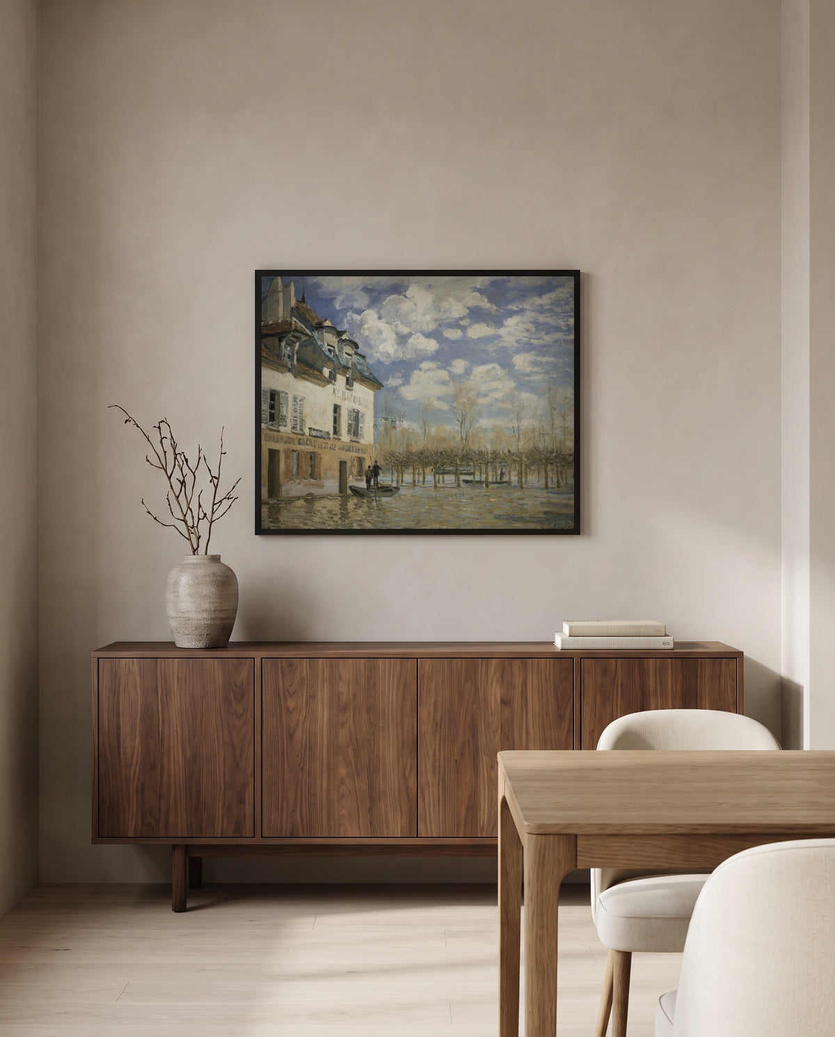 Boat in the Flood by Alfred Sisley in a black frame above a walnut sideboard in a dining room