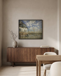 Boat in the Flood by Alfred Sisley in a black frame above a walnut sideboard in a dining room
