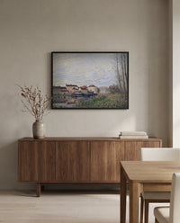 Evening in Moret by Alfred Sisley in a black frame above a walnut sideboard in a dining room