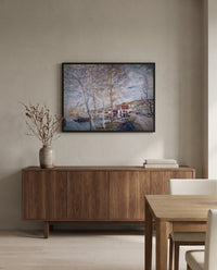 Flood at Moret by Alfred Sisley in a black frame above a walnut sideboard in a dining room