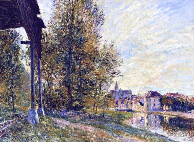 Near Moret-sur-Loing by Alfred Sisley: tall trees and a wooden shed by a canal, the town of Moret under a pale blue sky