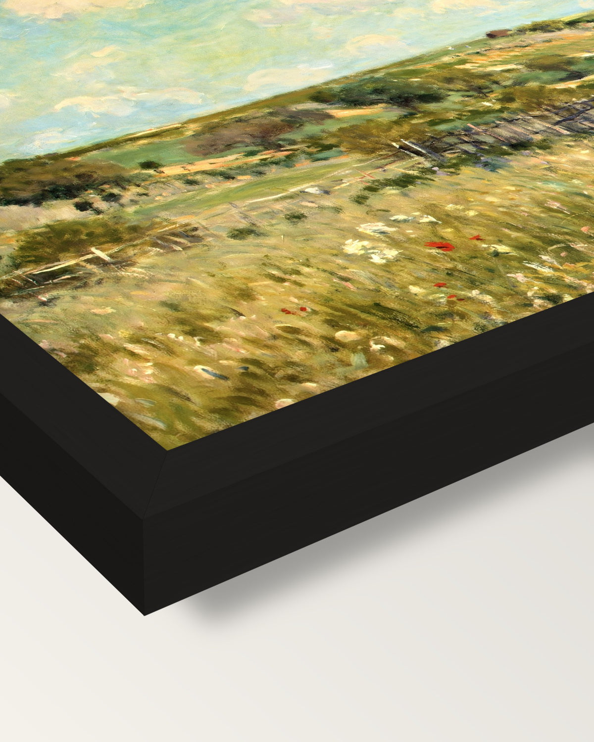 The Meadow by Alfred Sisley framed print, corner close-up: black moulding, mitred, the print set just below its edge