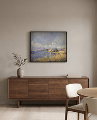 Seine at Billancourt by Alfred Sisley in a black frame above a walnut sideboard in a dining room