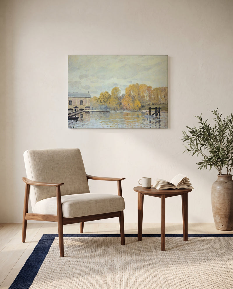 Waterworks at Marly by Alfred Sisley as a stretched canvas above a linen lounge chair in a reading corner