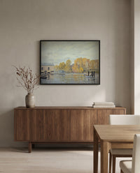 Waterworks at Marly by Alfred Sisley in a black frame above a walnut sideboard in a dining room
