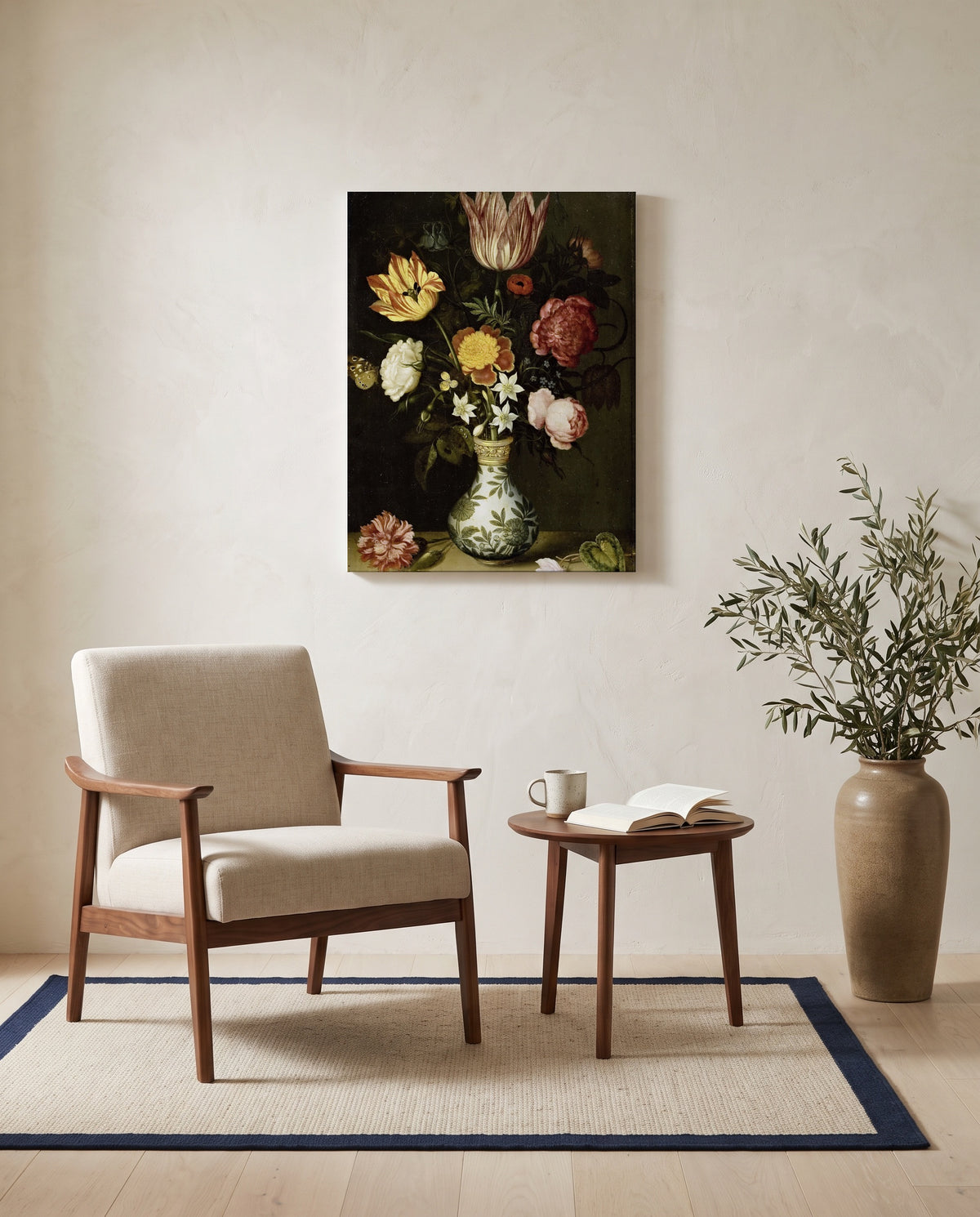 Flowers in a Wan-Li Vase by the Elder as a stretched canvas above a linen lounge chair in a reading corner