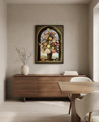 Vase of Flowers in a Niche by Ambrosius Bosschaert the Elder in a black frame above a walnut sideboard in a dining room