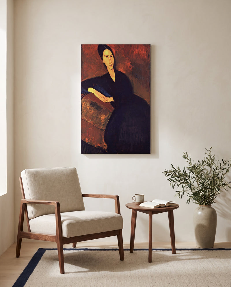 Anna Zborowska by Amedeo Modigliani as a stretched canvas above a linen lounge chair in a reading corner