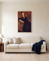 Anna Zborowska by Amedeo Modigliani framed in natural oak above a cream sofa in a warm living room