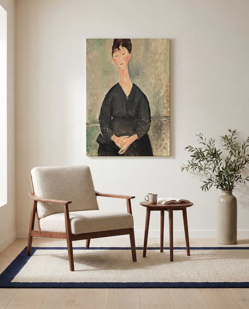 Café Singer by Amedeo Modigliani as a stretched canvas above a linen lounge chair in a reading corner