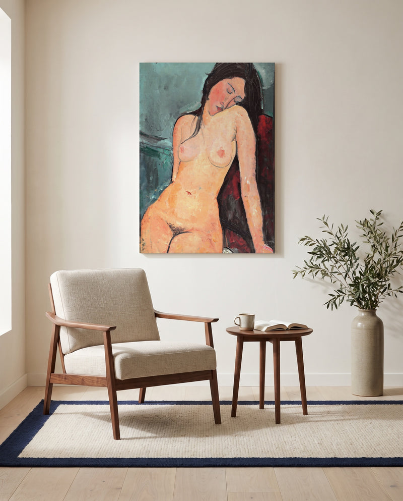 Female Nude by Amedeo Modigliani as a stretched canvas above a linen lounge chair in a reading corner
