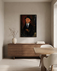 Paul Guillaume, Novo Pilota by Amedeo Modigliani in a black frame above a walnut sideboard in a dining room