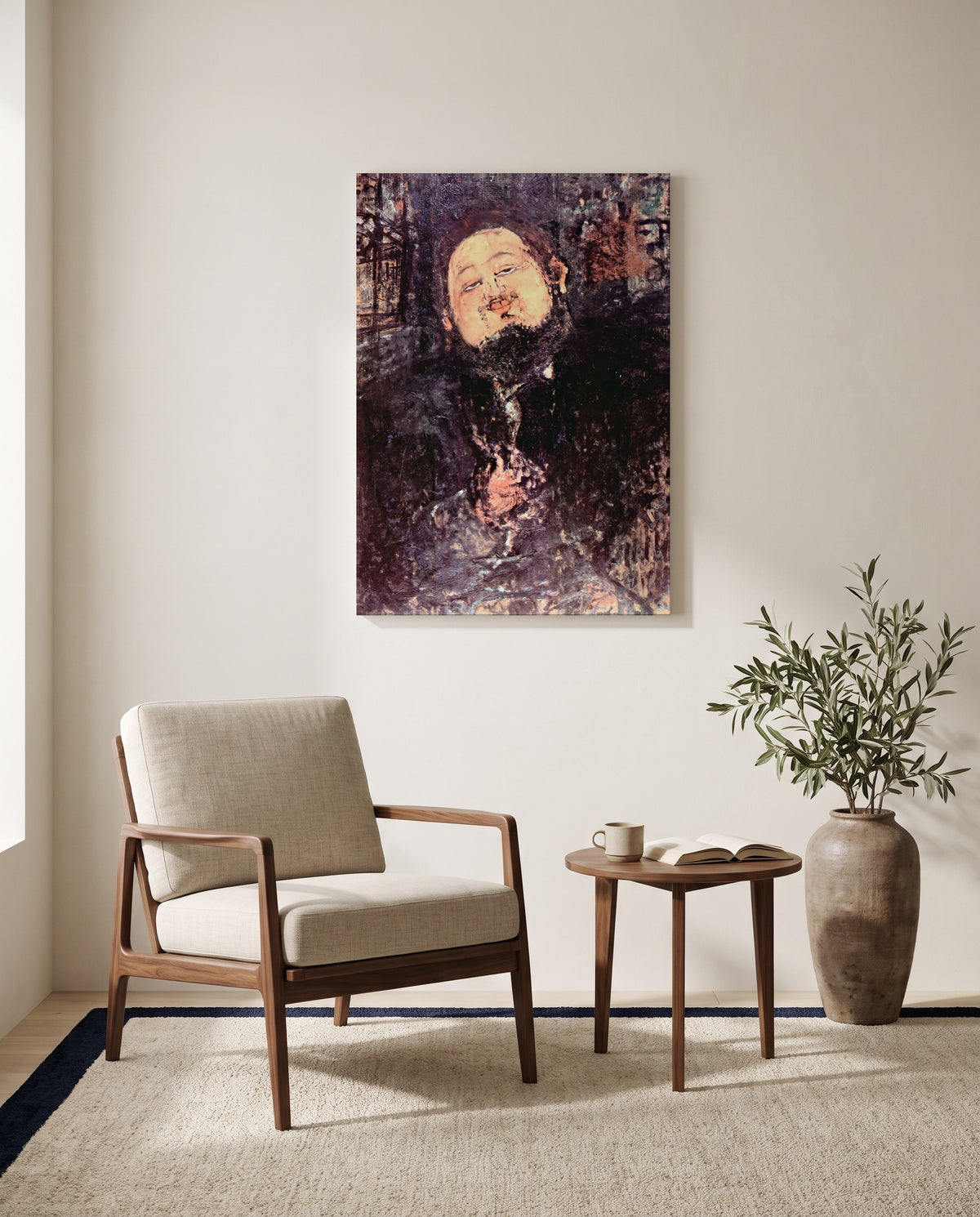 Diego Rivera by Amedeo Modigliani as a stretched canvas above a linen lounge chair in a reading corner
