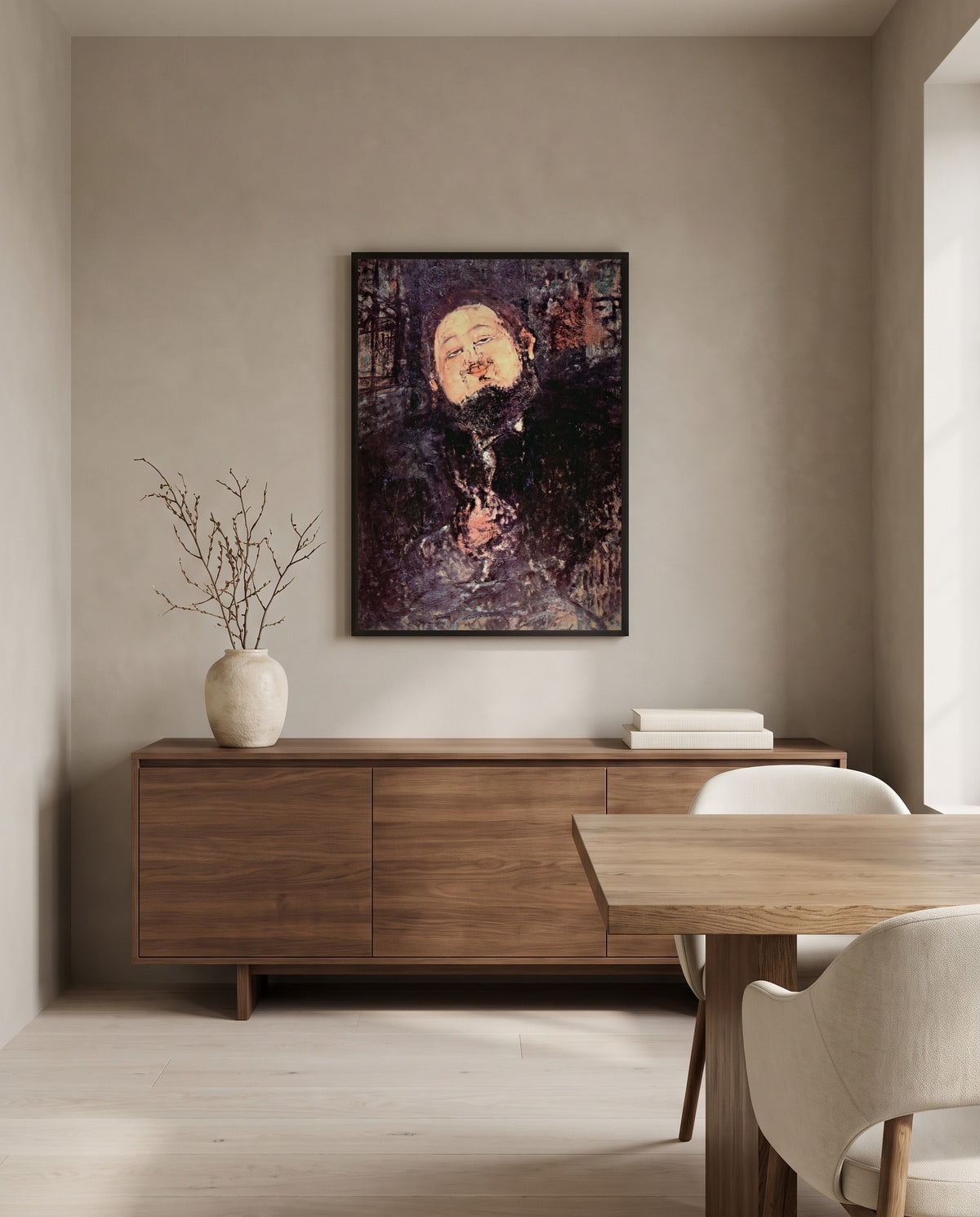 Diego Rivera by Amedeo Modigliani in a black frame above a walnut sideboard in a dining room