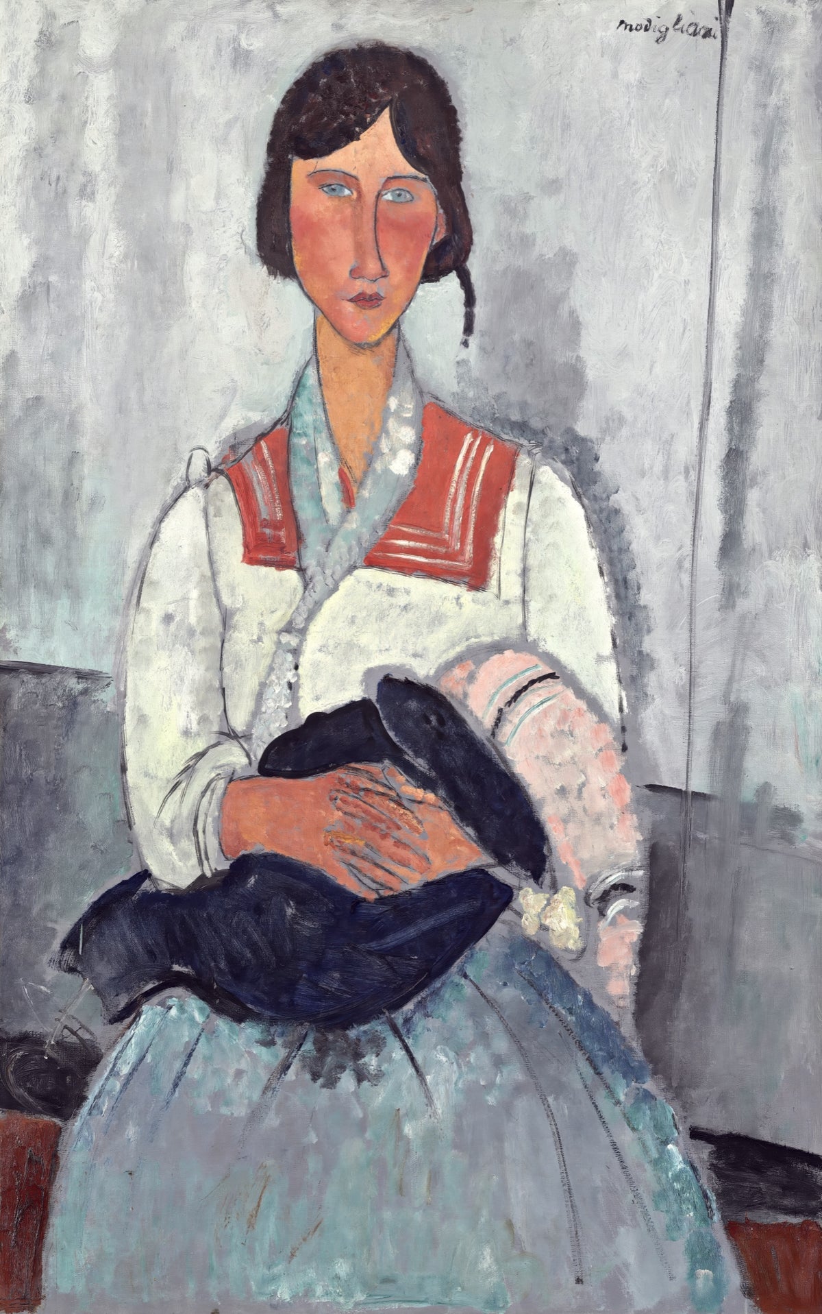 Roma Woman with Baby by Modigliani: a seated woman in a white blouse holding a baby wrapped in dark blue