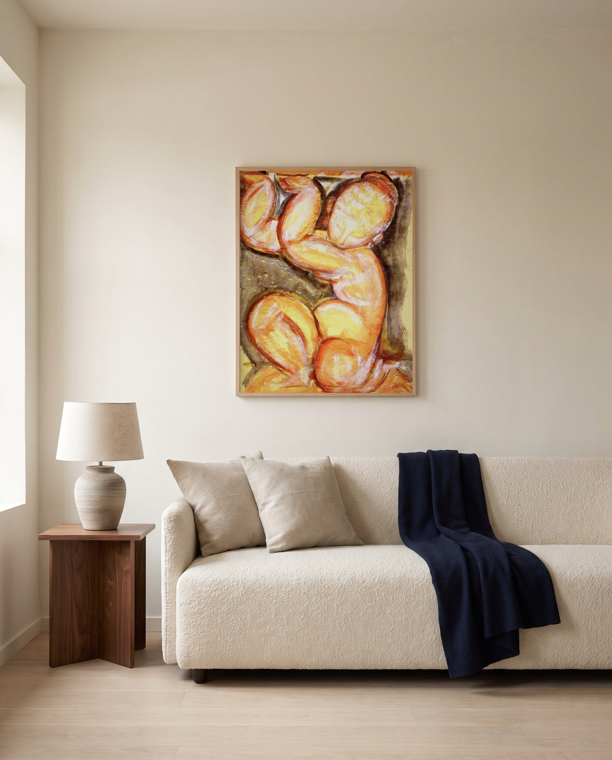 Rose Caryatid by Amedeo Modigliani framed in natural oak above a cream sofa in a warm living room