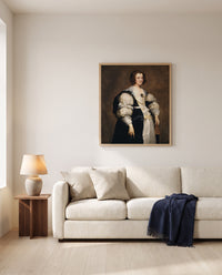 Lady with a Fan by Anthony van Dyck framed in natural oak above a cream sofa in a warm living room