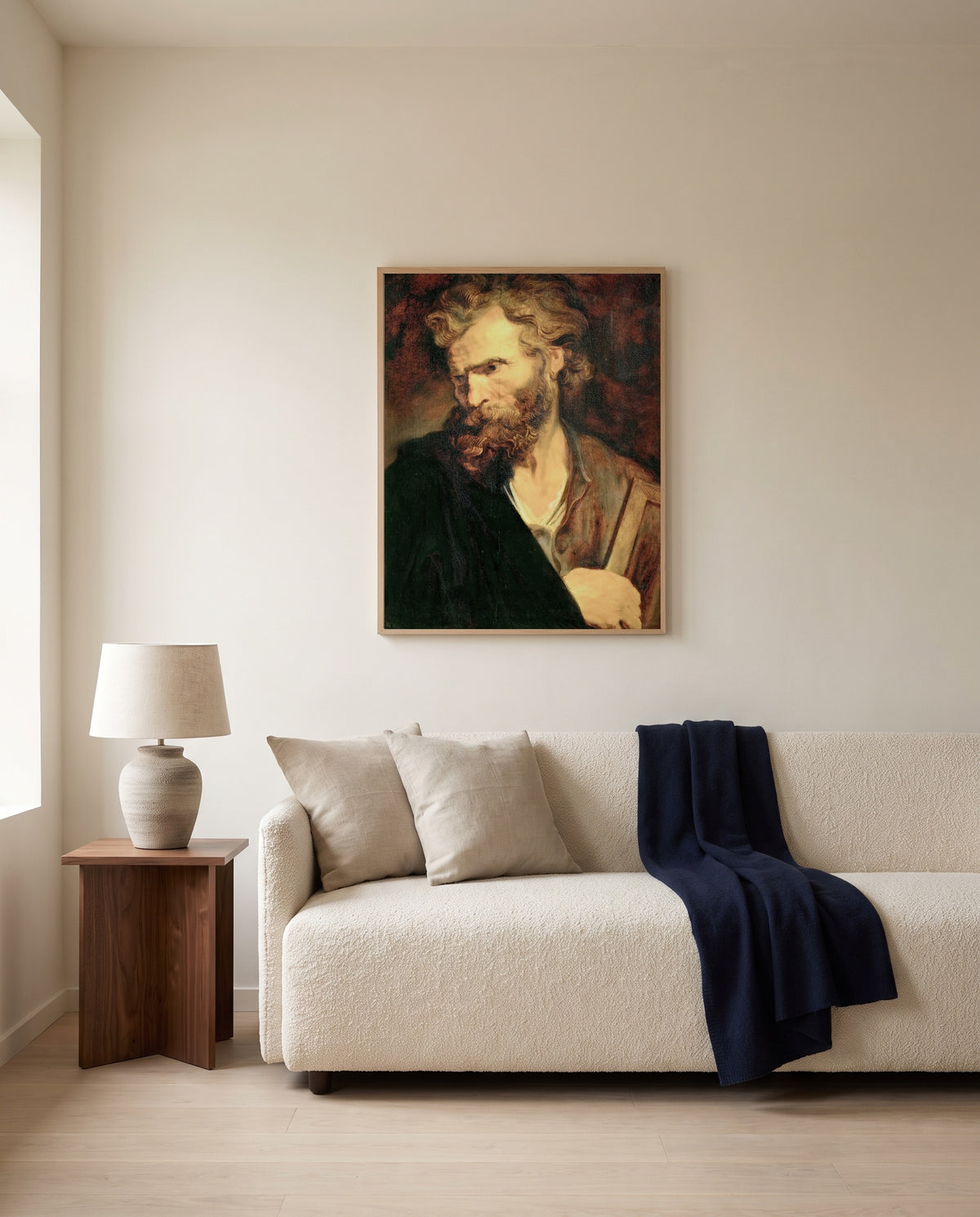 Apostle Judas Thaddeus by Anthony van Dyck framed in natural oak above a cream sofa in a warm living room