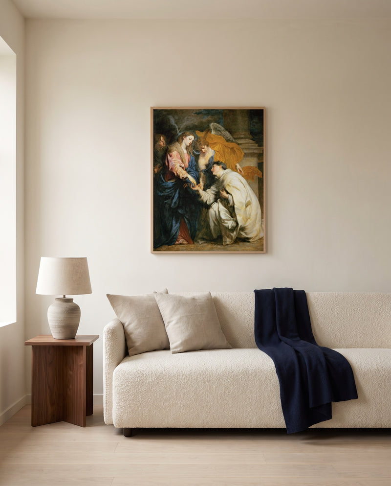 Vision of Hermann Joseph by Anthony van Dyck framed in natural oak above a cream sofa in a warm living room