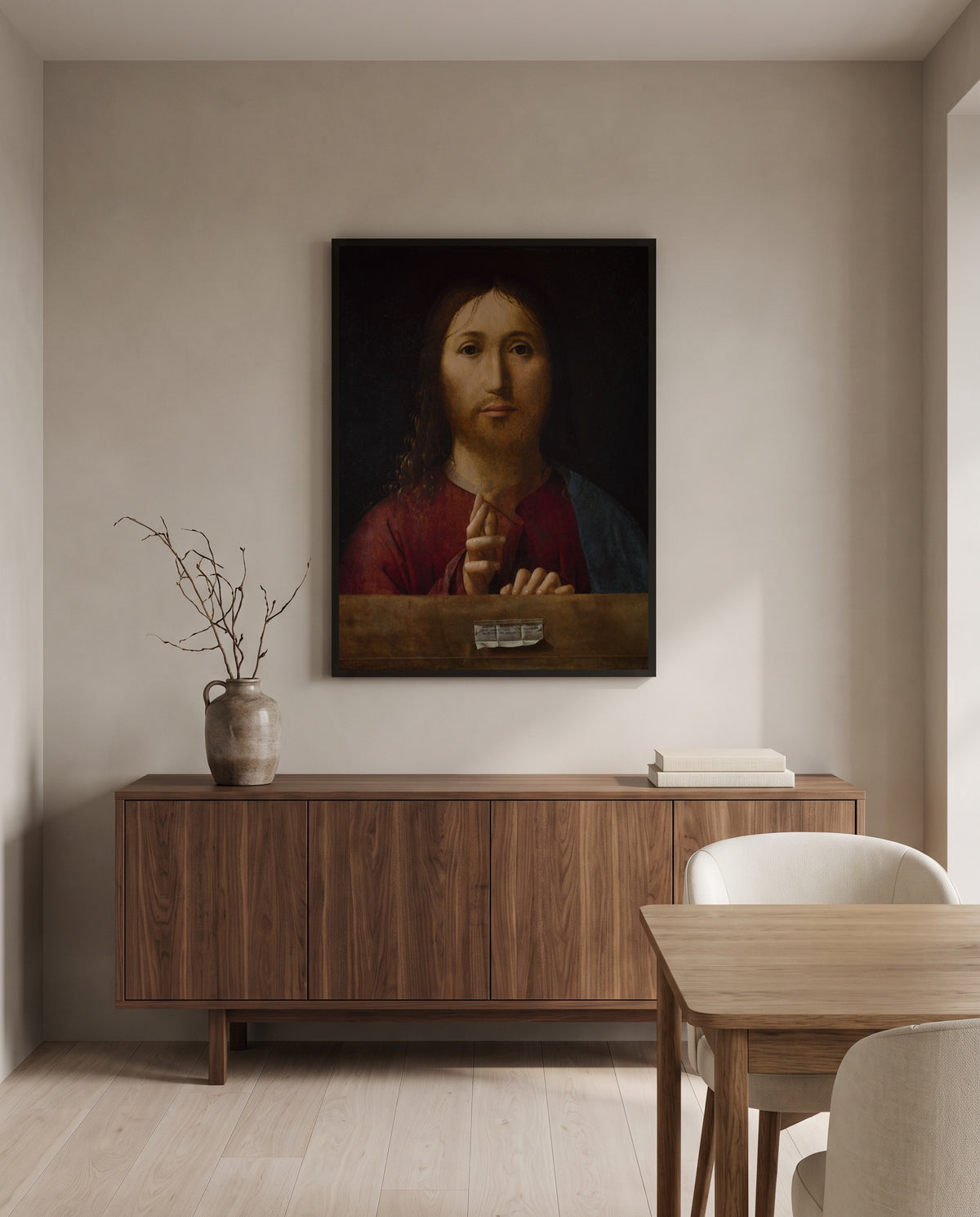 Christ Blessing by Antonello da Messina in a black frame above a walnut sideboard in a dining room