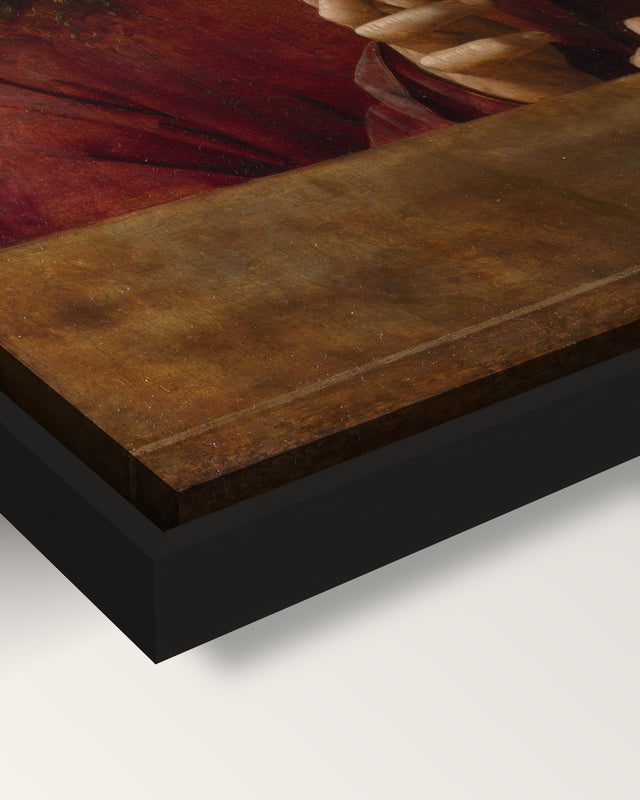 Christ Blessing framed canvas, corner close-up: the canvas in a slim black floating frame, its painted edge in the shadow gap