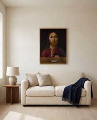 Christ Blessing by Antonello da Messina framed in natural oak above a cream sofa in a warm living room