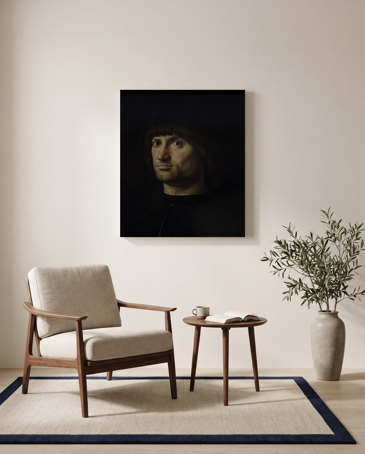 Il Condottiere by Antonello da Messina as a stretched canvas above a linen lounge chair in a reading corner