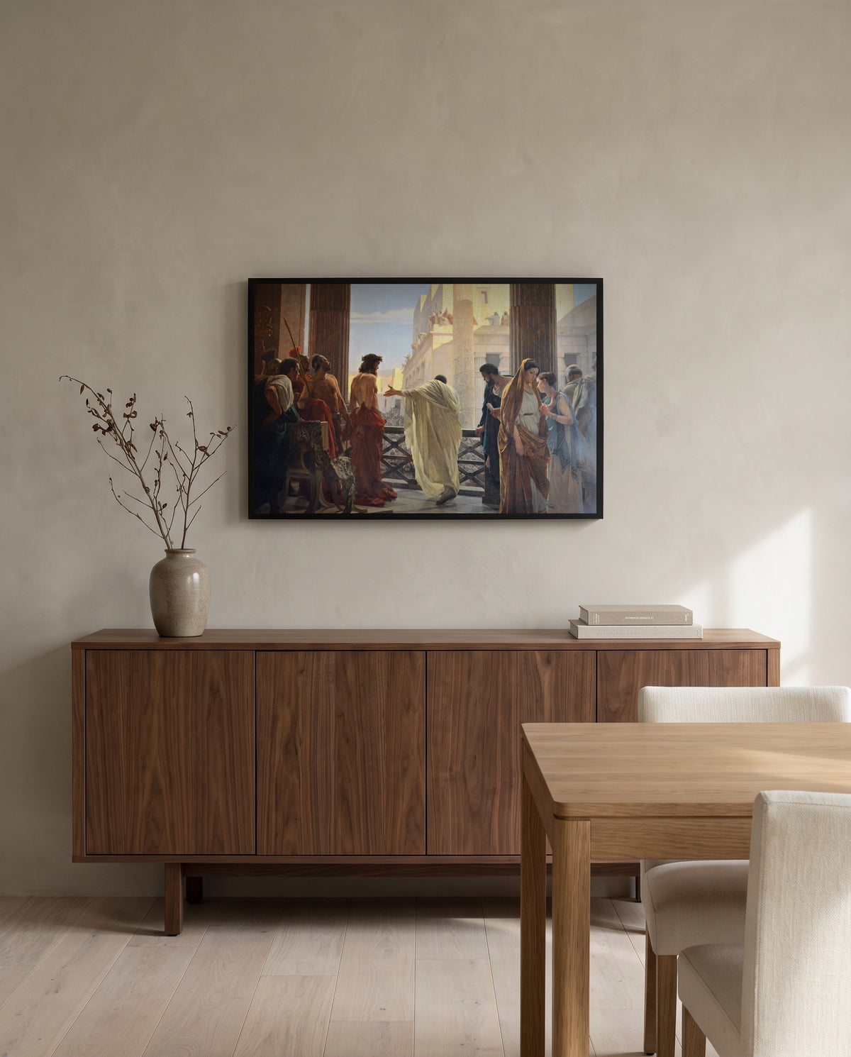 Ecce Homo by Antonio Ciseri in a black frame above a walnut sideboard in a dining room