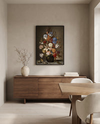 Still Life with Flowers by Balthasar van der Ast in a black frame above a walnut sideboard in a dining room