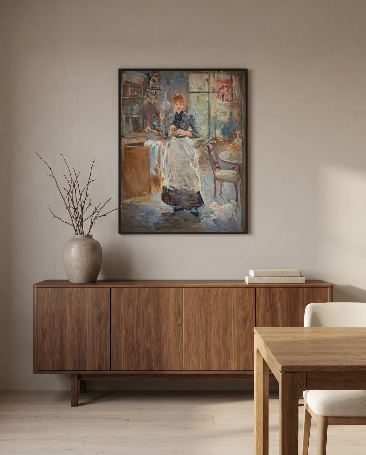 In the Dining Room by Berthe Morisot in a black frame above a walnut sideboard in a dining room