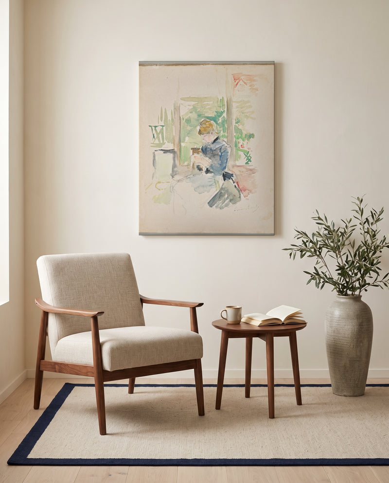 Sewing near the Window by Berthe Morisot as a stretched canvas above a linen lounge chair in a reading corner