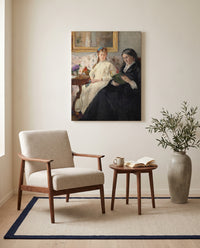 Mother and Sister by Berthe Morisot as a stretched canvas above a linen lounge chair in a reading corner