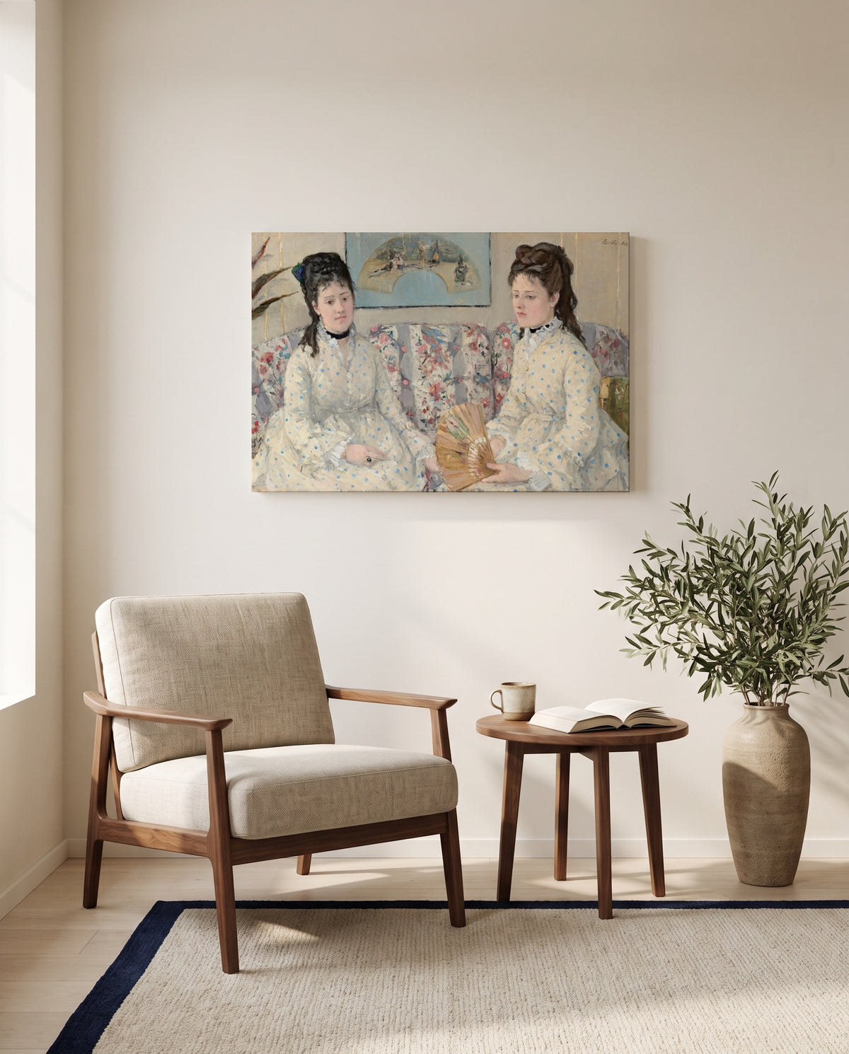 The Sisters by Berthe Morisot as a stretched canvas above a linen lounge chair in a reading corner