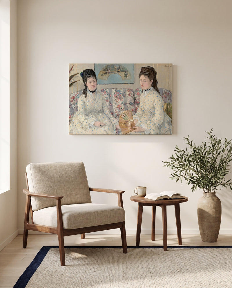 The Sisters by Berthe Morisot as a stretched canvas above a linen lounge chair in a reading corner