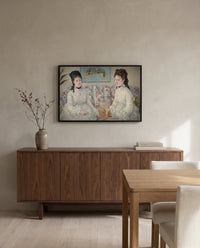 The Sisters by Berthe Morisot in a black frame above a walnut sideboard in a dining room